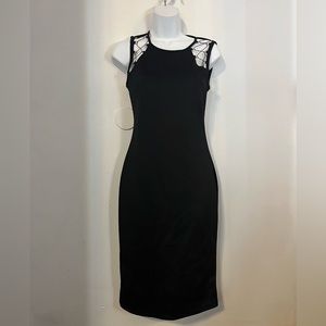 Black fitted dress good for multiple occasions